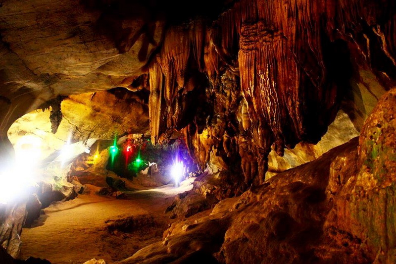 Colorfully Lit Cave Interior at Chiang Dao Cave Cave interior with colorful lights illuminating rock formations and stalactites at Chiang Dao Cave.