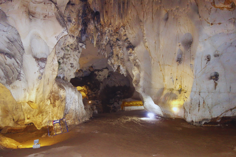 Cave Interior Exploration at Mueang On Cave Interior view of a cave with uneven rocks and soft lighting at Mueang On Cave.