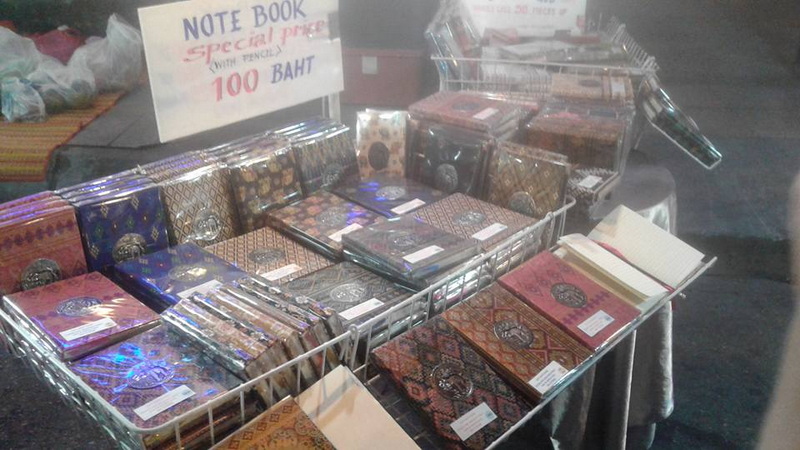 Patterned Notebooks Display at Sunday Market Chiang Mai Notebooks with patterned covers on a market stall at Chiang Mai Sunday Night Market at Sunday Market Chiang Mai.