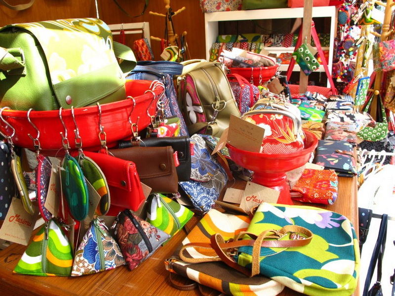 Vivid display of various bags and accessories at a marketplace stall at Nimmanhaemin road.
