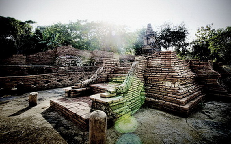 Ancient Brick Ruins in Nature at Chiang Mai Cruise To Wiang Kum Kam Ruins of an ancient brick structure surrounded by trees and greenery at Chiang Mai Cruise To Wiang Kum Kam.
