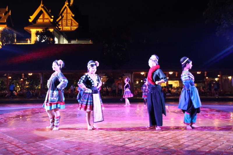 Traditional Dance Performance at Khum Khantoke Women in traditional costumes dancing on stage during a night festival at Khum Khantoke.