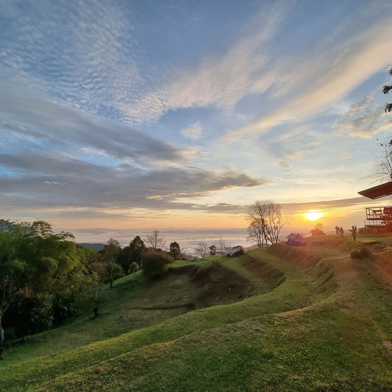 Sunset View at Doi Luang Chiang Dao Sunset over a grassy hill at Doi Luang Chiang Dao.
