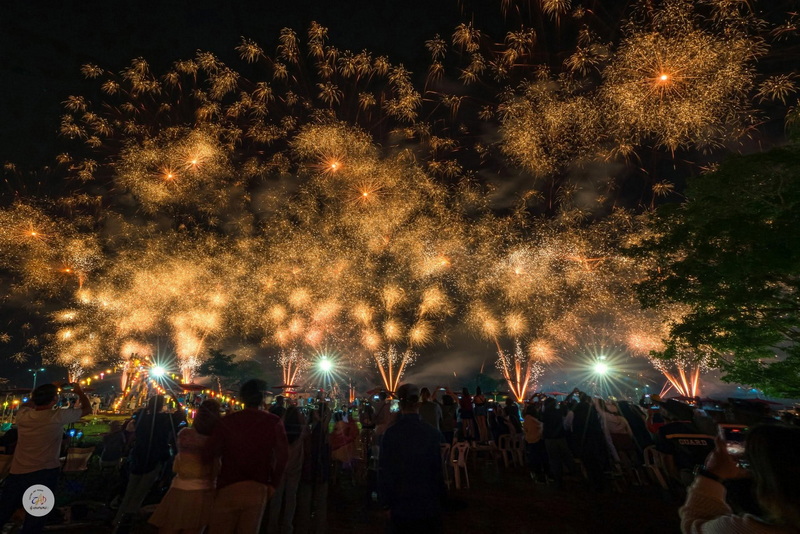 Night Fireworks Celebration at Chiang Mai New Year Countdown 2027 by CAD Crowd watching vibrant fireworks display in the night sky at Chiang Mai New Year Countdown 2027 by CAD.