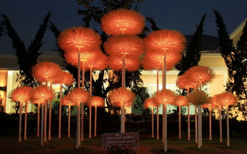 Decorative Lights at Night at Royal Flora Ratchaphruek Night scene with illuminated decorative light fixtures resembling dandelions outdoors at Royal Flora Ratchaphruek.