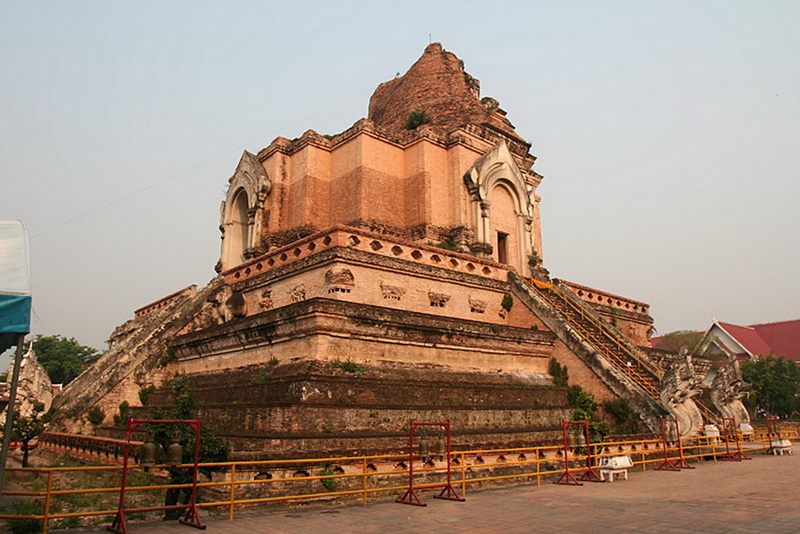 Historic Brick Stupa at Chedi Luang temple Ancient brick stupa with ornate details and staircase outside at Chedi Luang temple.
