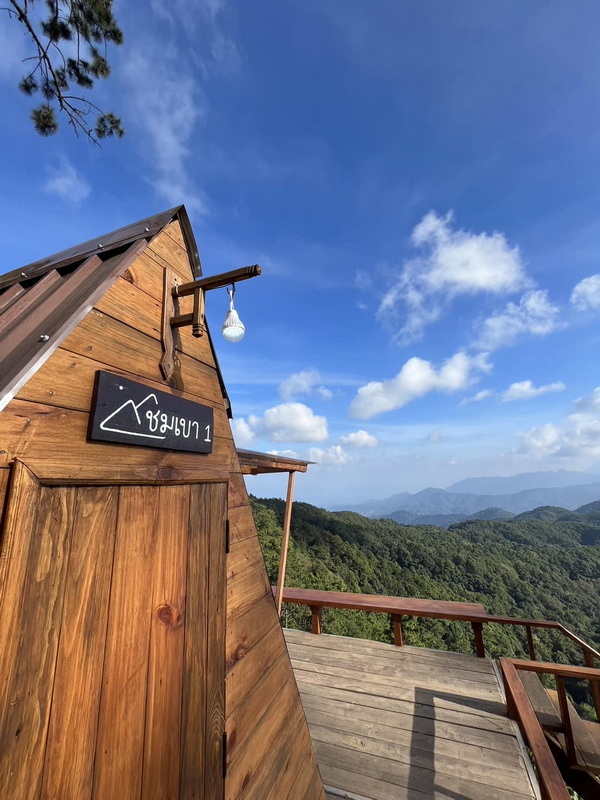 Viewpoint at Pha Daeng National Park Wooden deck overlooking the forested mountains of Pha Daeng National Park.