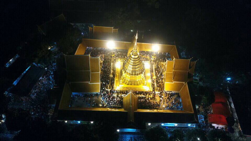 Night View of Golden Stupa at Things To Do In Chiang Mai Evening Aerial view of a golden stupa illuminated at night within a square structure at Things To Do In Chiang Mai Evening.