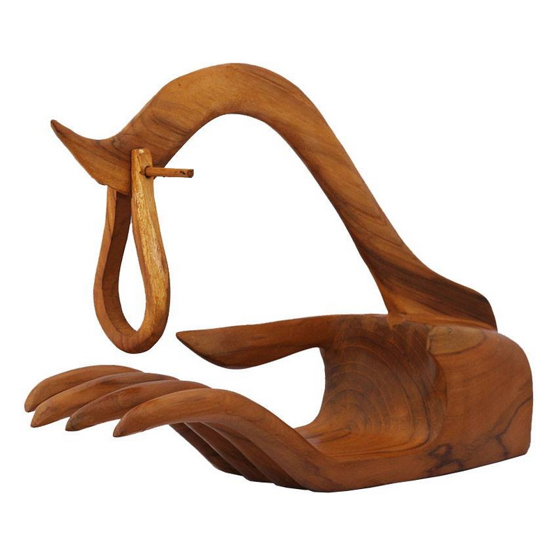 Wooden Bird Carving at Baan Tawai Carved wooden bird sculpture with elongated neck and smooth curves at Baan Tawai.